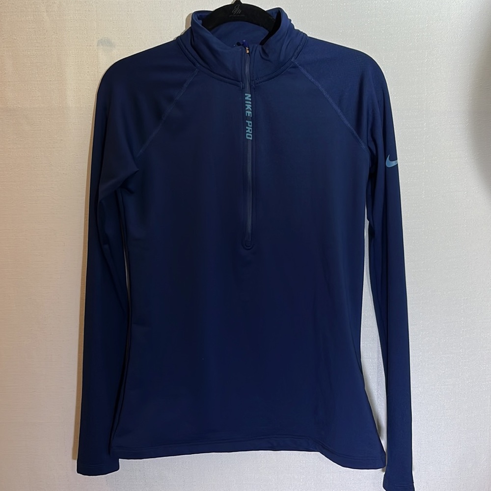 Nike Pro blue 1/4 zip top, size medium, in very good condition, thicker fabric.